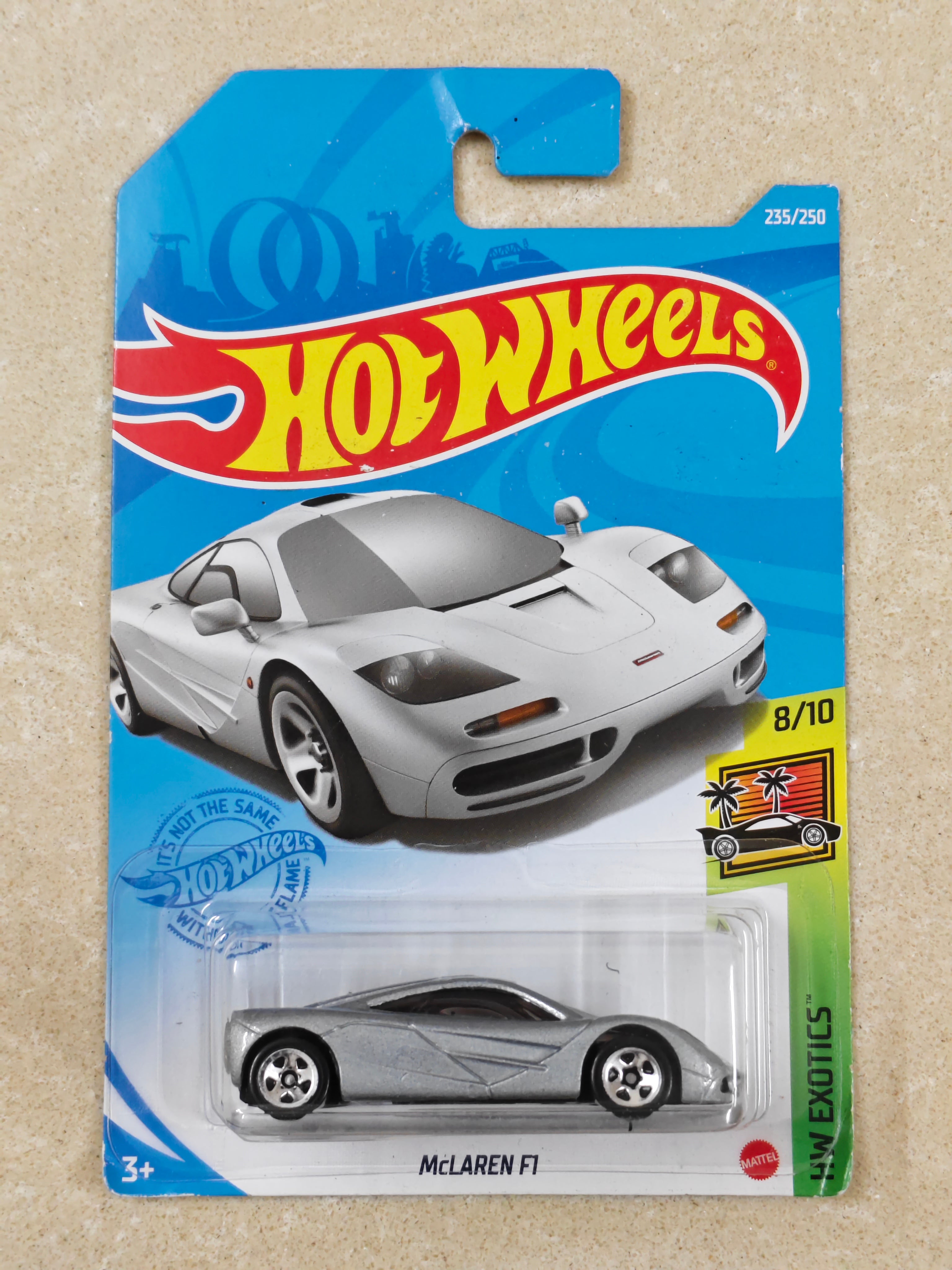 Hot Wheels - Imported - McLaren F1 Silver - Diecast Car - 1:64 Scale (Soft Corner & Creased J Hook))