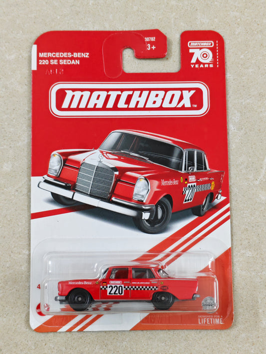 Matchbox - US Imported Red Edition- Mercedes Benz 220 SE Sedan - Diecast Car - 1:64 Scale (Cracked Blister)