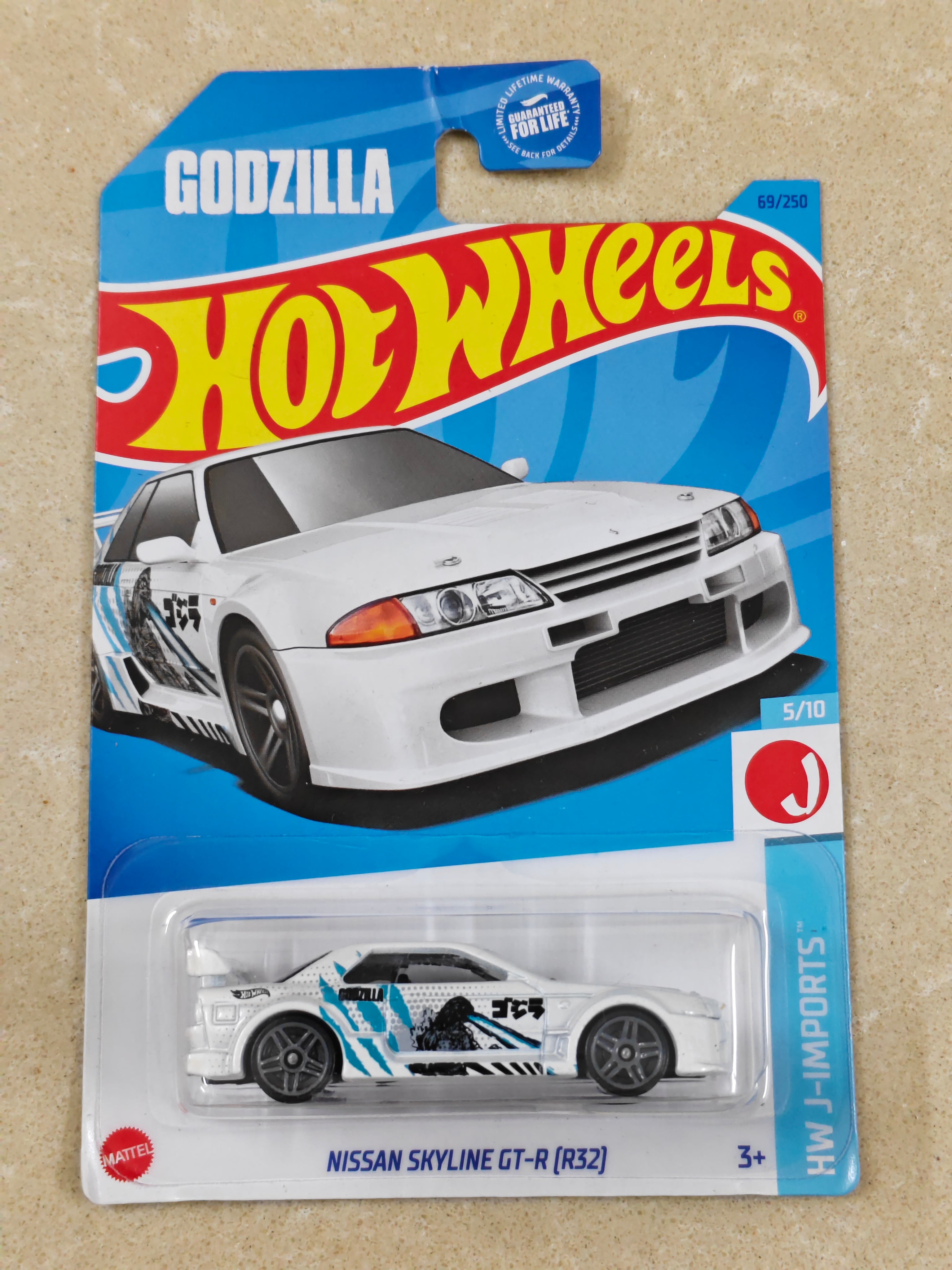 Hot Wheels - US Imported - Godzilla - Nissan Skyline GT R (R32) - Diecast Car - 1:64 Scale (Creased J Hook)